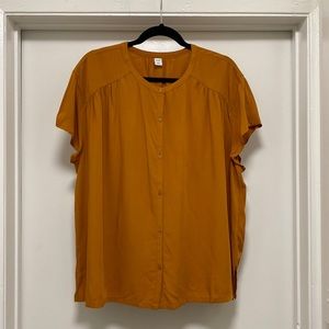 Worn once: mustard yellow, loose fitting short sleeved, silky button down.